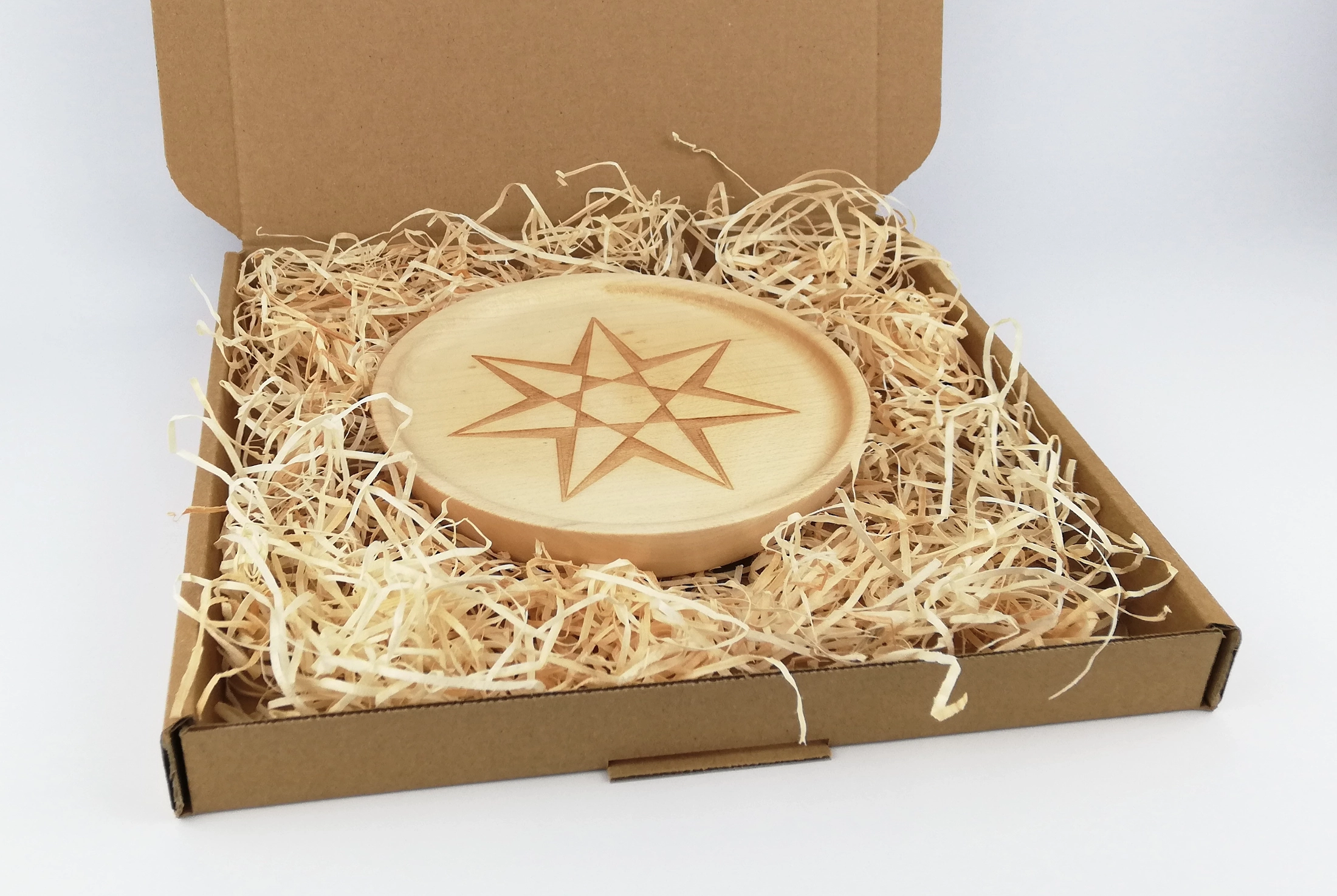 Heptagram on a small plate (16cm/6.3in in diameter), packed in a box.
