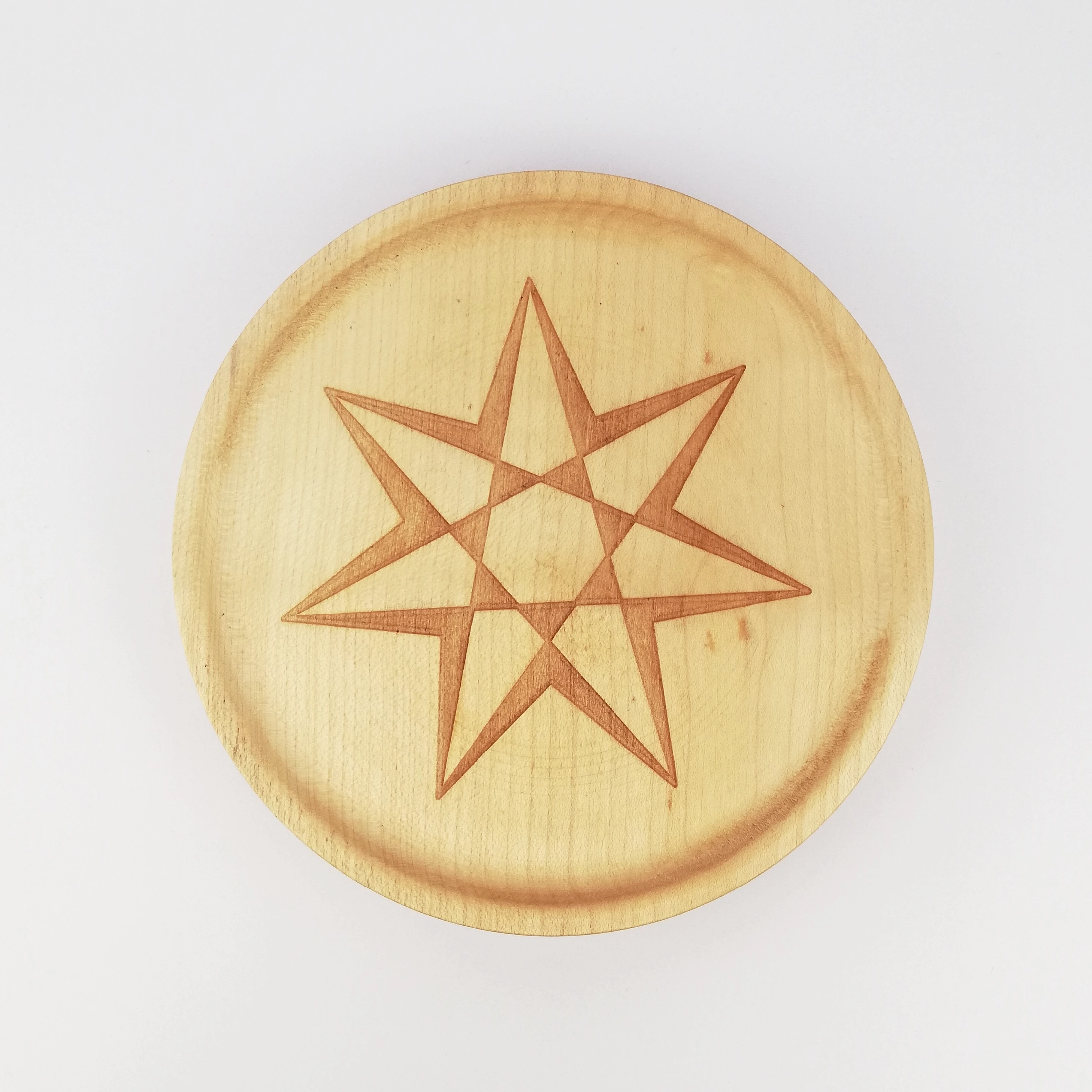 Heptagram on a small plate (16cm/6.3in in diameter), front.